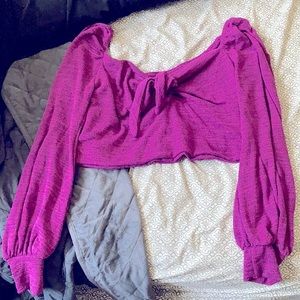 Cropped sweater/shirt.